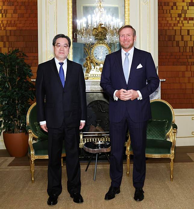 Chinese Vice Premier Ding Xuexiang, also a member of the Standing Committee of the Political Bureau of the Communist Party of China Central Committee, meets with Dutch King Willem-Alexander in The Hague, the Netherlands, Jan. 22, 2025. (Xinhua/Huang Jingwen)