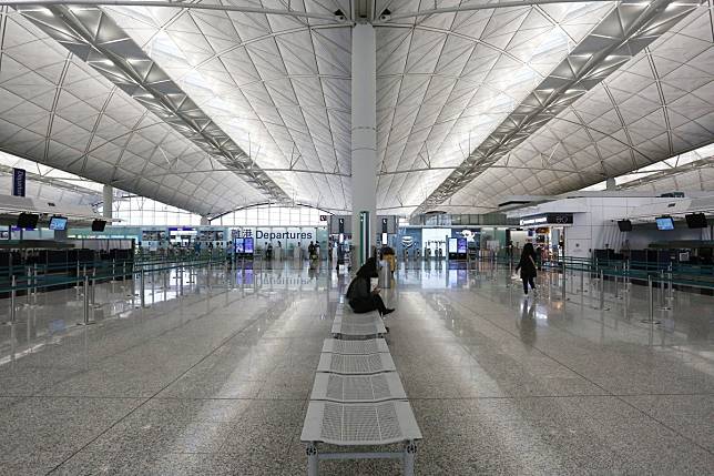 A deserted departure hall at Hong Kong’s airport. Photo: Jonathan Wong