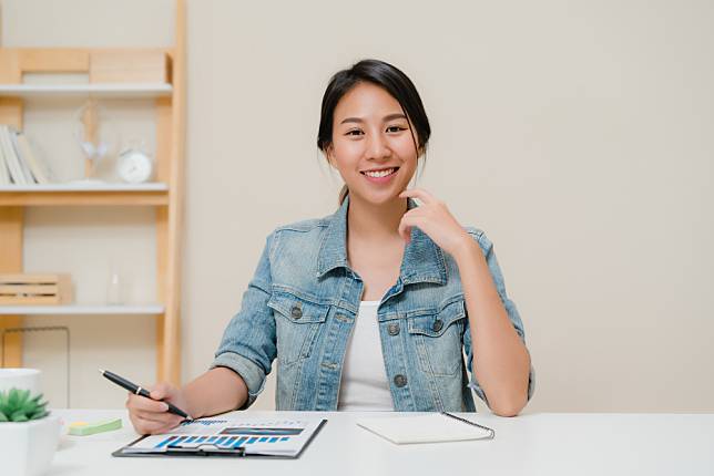 asia-business-woman-feeling-happy-smiling-looking-camera-while-relax-home-office