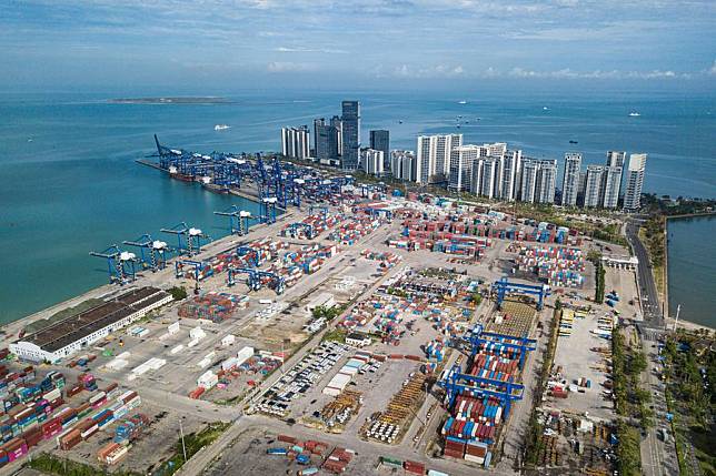 An aerial drone photo taken on Oct. 18, 2024 shows a container terminal in Haikou, south China's Hainan Province. (Xinhua/Pu Xiaoxu)