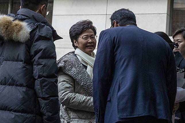 Carrie Lam arrives to a hotel in Beijing on Saturday. Photo: EPA