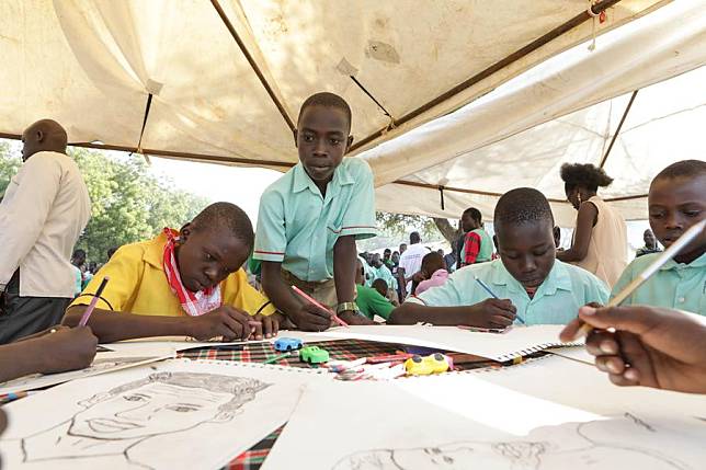 Pupils participate in art drawing during a sports and art gala at Kasemeri Primary School in Moroto, northeastern Uganda, on June 20, 2024. (Photo by Hajarah Nalwadda/Xinhua)