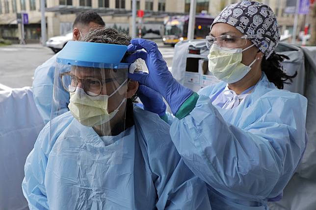 In the United States, where there is a shortage of personal protective equipment (PPE), authorities have encouraged people to make their own facial coverings to ensure that surgical masks and higher end respirators are reserved for frontline medical staff. Photo: AP
