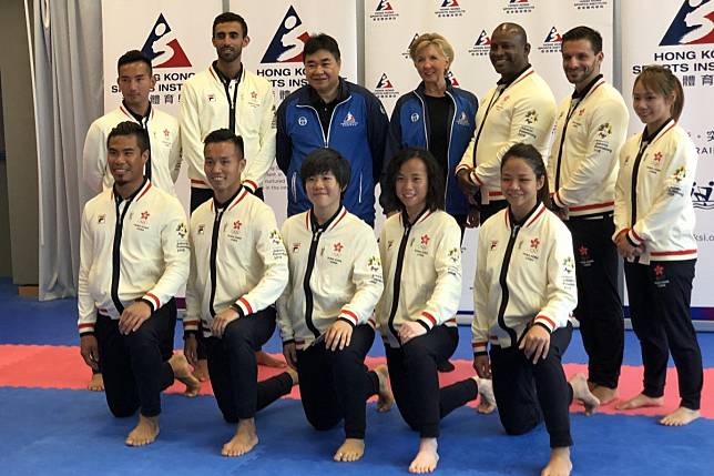 Karate coach Rida Bel-Lahsen (second from left, back row) with the squad for the 2018 Asian Games. He has become the forth member of the karate team to test positive for coronavirus. Photo: Chan Kin-wa