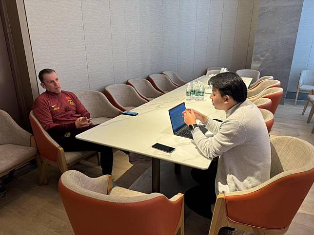 Dejan Djurdjevic (L), head coach of China men's U20 football team, speaks in an interview with Xinhua. (Xinhua)