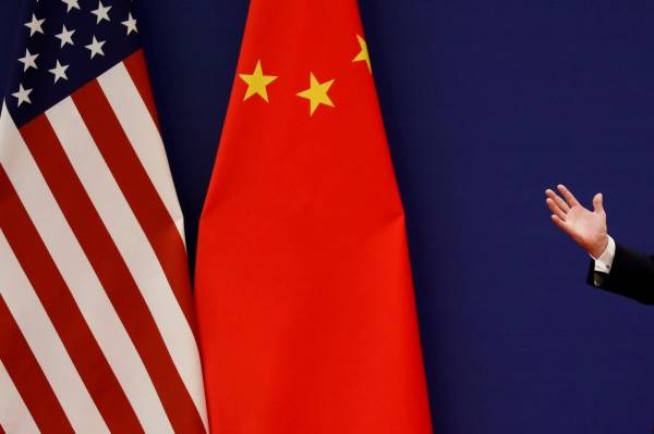《南華早報》指美國企業無意在貿易戰中幫中國說話。(路透)