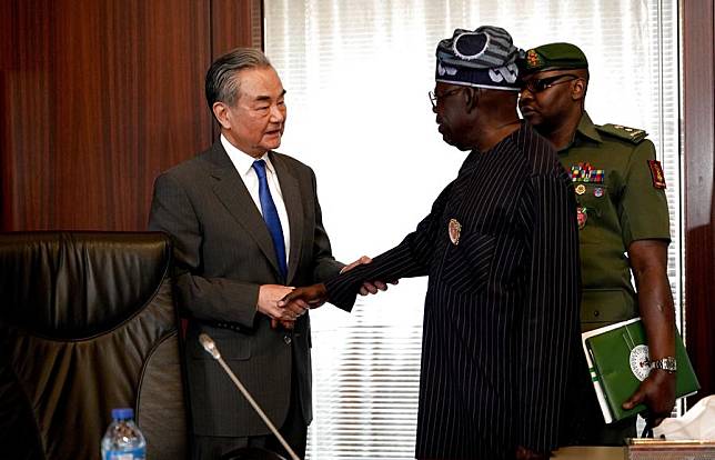 Nigerian President Bola Ahmed Tinubu meets with Chinese Foreign Minister Wang Yi, also a member of the Political Bureau of the Communist Party of China Central Committee, in Abuja, Nigeria, on Jan. 9, 2025. (Xinhua/Yang Zhe)