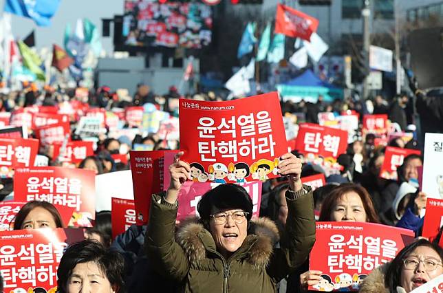 People attend a rally calling for the impeachment of South Korea's President Yoon Suk-yeol near the National Assembly in Seoul, South Korea, Dec. 14, 2024. (Xinhua/Yao Qilin)