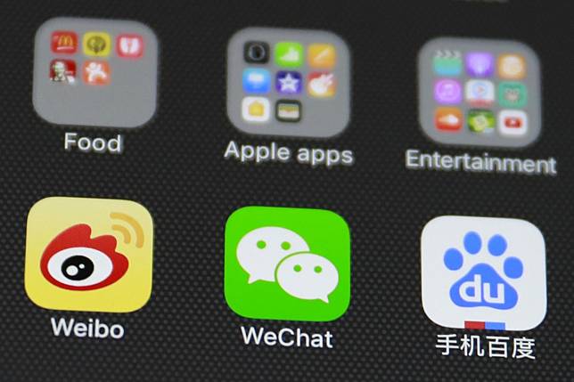 Icons of Chinese social media apps Weibo, WeChat and Baidu are displayed on a smartphone screen in 2017. File photo: EPA