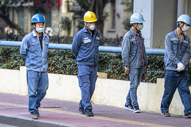 Uncertainty awaits many workers as Guangdong province tries to get back to business. Photo: EPA-EFE