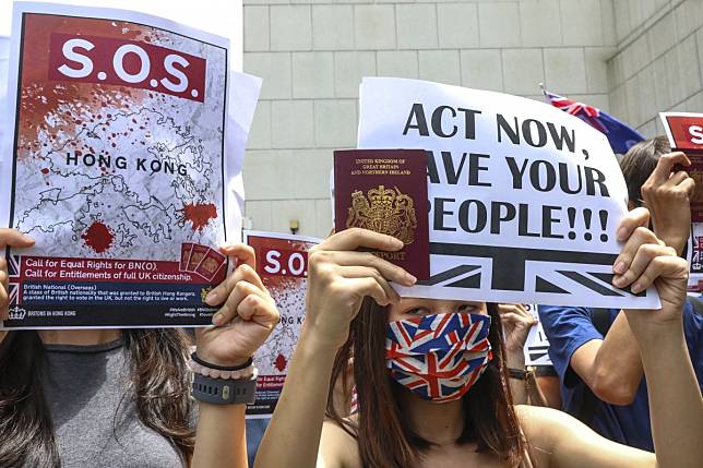 For the second time in a fortnight, holders of British National (Overseas) Passports rally outside the British consulate in Hong Kong, on September 15, to demand the same rights as British passport holders. Photo: K. Y. Cheng