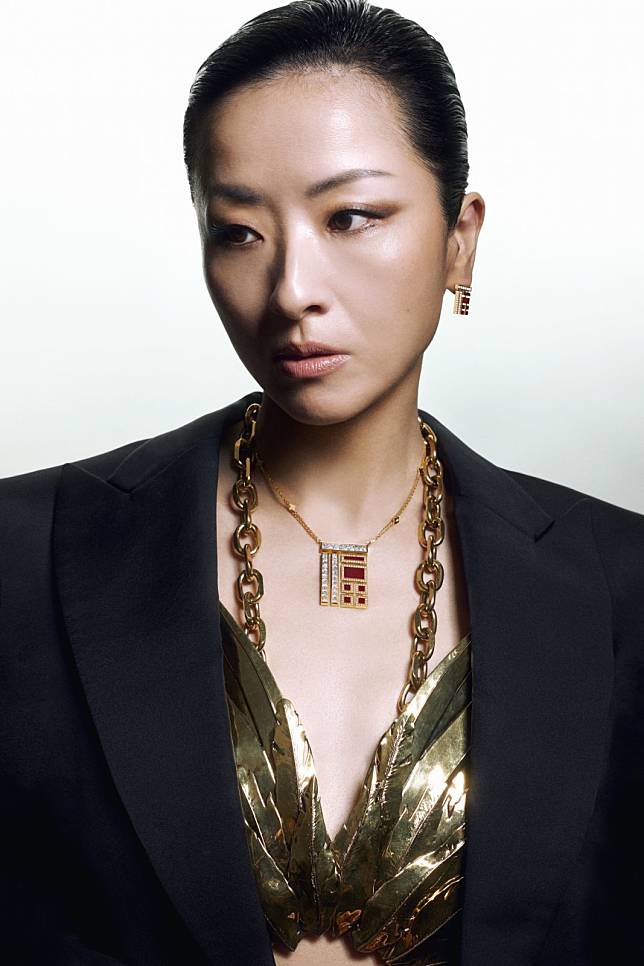 Hilary Tsui wearing Chow Tai Fook’s new Rouge Collection in 18K yellow gold diamond necklace and earrings (Photo: Karl Lam / Tatler Hong Kong)