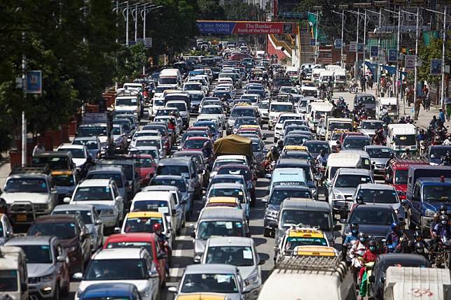 Vehicles stuck in a traffic jam at a police checkpoint in Kathmandu, Nepal, July 17, 2020. (Photo by Sulav Shrestha/Xinhua)