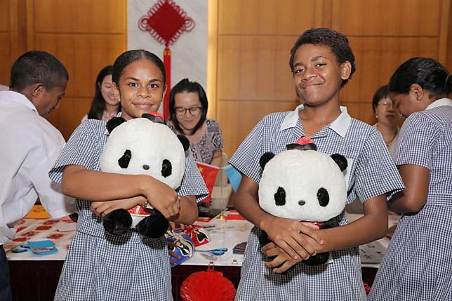 Two Fijian students are pictured during an open-day event at the Chinese Embassy in Fiji, in Suva, Fiji, Nov. 15, 2024. (Photo by Sang Qinlong/Xinhua)