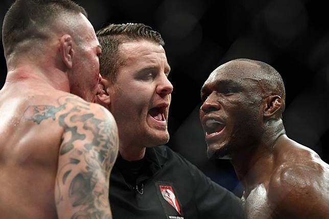 Kamaru Usman (right) and Colby Covington are separated after their bout at UFC 245 in 2019. Photo: USA Today