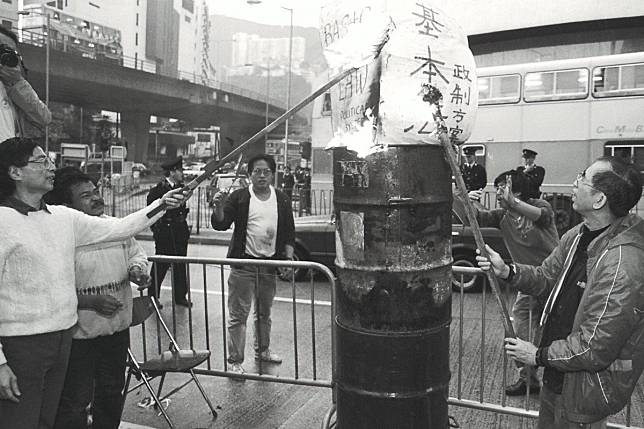 Martin Lee and other pro-democracy figures burn papers representing the Basic Law in February 1990, months before the mini-constitution came into force. Photo: SCMP Pictures