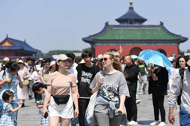Tourists visit the Temple of Heaven in Beijing, capital of China, May 2, 2024. (Xinhua/Ju Huanzong)
