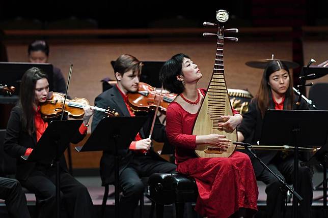 Prominent pipa virtuoso Wu Man (R, Front) performs with members of the Bard East/West Ensemble during the opening concert of the sixth annual China Now Music Festival at Rose Theater at Jazz at Lincoln Center in New York, the United States, on Oct. 4, 2023. (Xinhua/Li Rui)