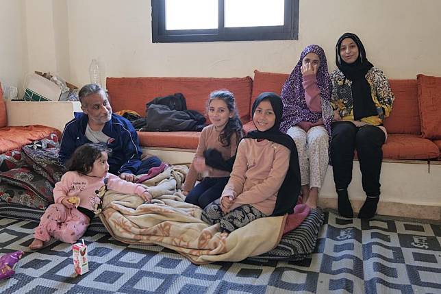 This photo, taken on March 22, 2024, shows Mohammad Salem, a Palestinian refugee with his family at the Mar Elias Camp in Beirut who suffers from chronic kidney disease. (Photo by Dana Halawi/Xinhua)