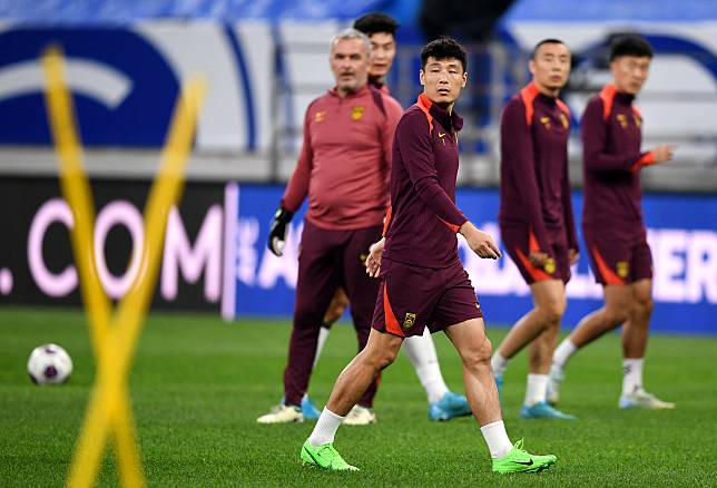 Wu Lei (front) participates in a training session in Qingdao, east China's Shandong Province, Oct. 14, 2024, one day ahead of the 2026 FIFA World Cup Asian Qualifiers Group C match against Indonesia. (Xinhua/Li Ziheng)