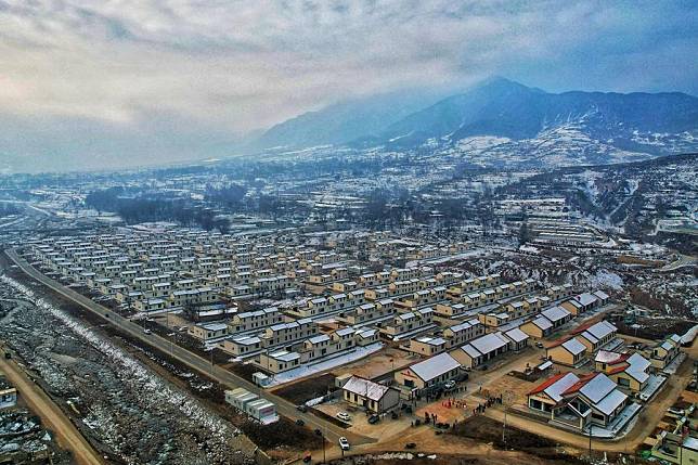 An aerial drone photo taken on Dec. 6, 2024 shows a resettlement area in Liuji Township of Jishishan County, northwest China's Gansu Province. (Photo by Zhang Weiji/Xinhua)