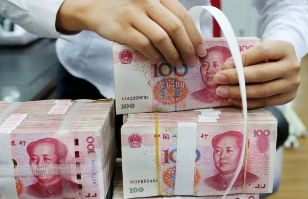 台商近日從中國匯出資金，遭中國外匯管理局強索 10%的巨額手續費。(法新社)