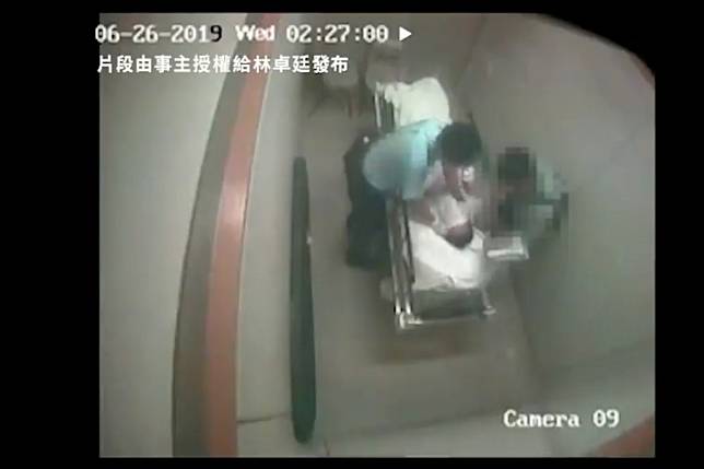 Two policemen were caught on camera beating a suspect in a Hong Kong hospital. Photo: Handout