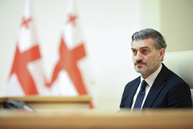 The ruling Georgian Dream party's candidate, Mikheil Kavelashvili, waits for the result of the presidential election at the session hall of the parliament in Tbilisi, Georgia, Dec. 14, 2024. (Georgian Parliament/Handout via Xinhua)