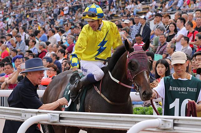 Hugh Bowman and John Moore celebrate Werther’s victory at Sha Tin. Photos: Kenneth Chan