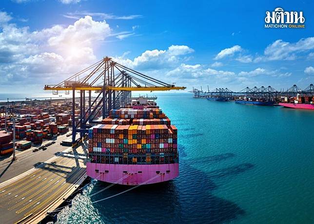 Aerial view of cargo ship and cargo container in harbor.