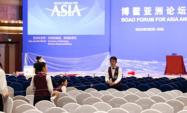 Staff members work at the main venue of Boao Forum for Asia (BFA) Annual Conference 2024 in Boao, south China's Hainan Province, March 25, 2024. (Xinhua/Yang Guanyu)