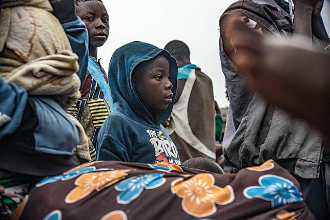 Displaced people are seen at the Nzulo port, near Goma, North Kivu Province, eastern Democratic Republic of the Congo (DRC), on Jan. 23, 2025. (Photo by Zanem Nety Zaidi/Xinhua)