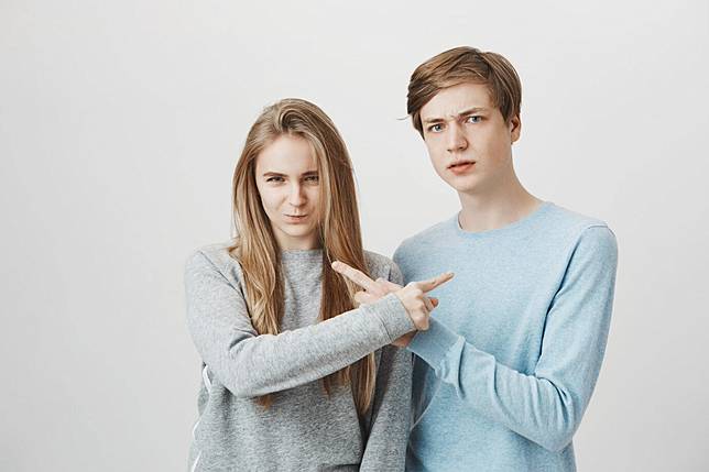 guy-girl-accuse-each-other-siblings-pointing-fingers_176420-17256