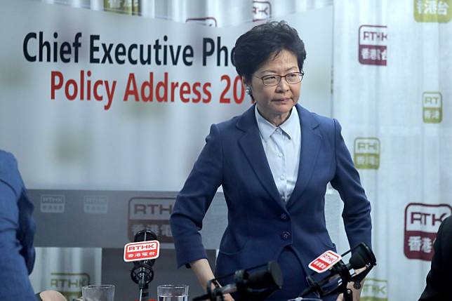 Chief Executive Carrie Lam Cheng Yuet-ngor attends an RTHK phone-in programme about her upcoming policy address. Photo: Jonathan Wong