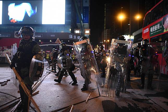A lawyer is challenging police on their handling of his disabled client, who was arrested during protests outside Mong Kok Police Station, a location often embroiled in chaos. Photo: AFP