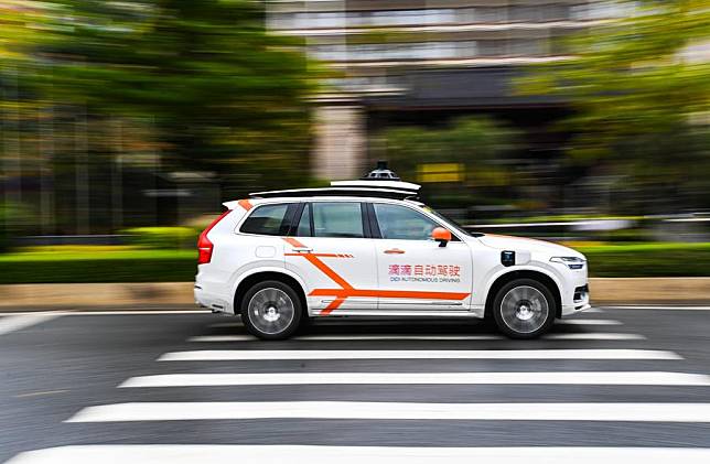 Didi autonomous driving vehicle runs on a street in Huadu District of Guangzhou, south China's Guangdong Province, March 27, 2023. (Xinhua/Liu Dawei)