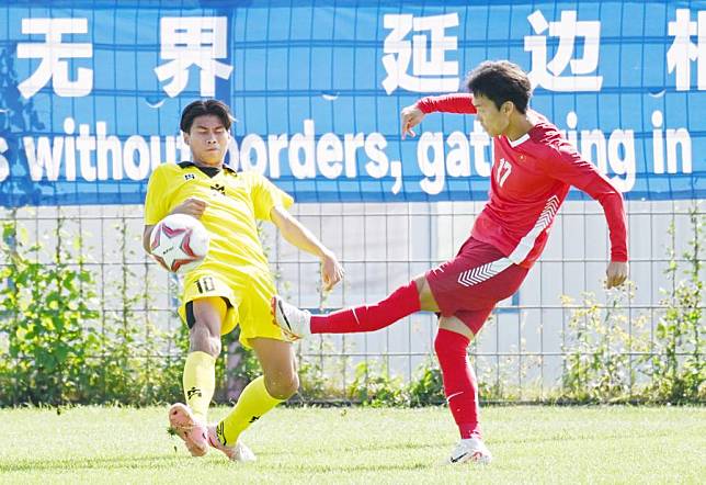 Players compete at the 2nd Asian University Sports Federation Football Cup in Longjing City, Yanbian Korean Autonomous Prefecture, northeast China's Jilin Province.