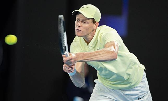 Jannik Sinner hits a return during the men's singles quarterfinal between Jannik Sinner of Italy and Alex de Minaur of Australia at Australian Open tennis tournament in Melbourne, Australia, Jan. 22, 2025. (Photo by Hu Jingchen/Xinhua)