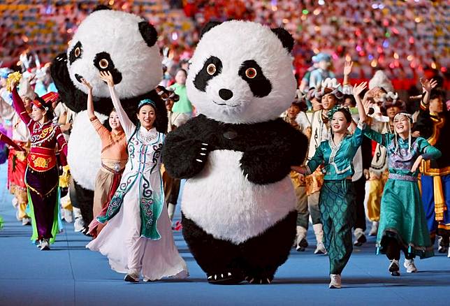 Performers participate during the opening ceremony of The 12th National Traditional Games of Ethnic Minorities of China, Nov 22, 2024, in Sanya, China. (Xinhua/Chen Zeguo)