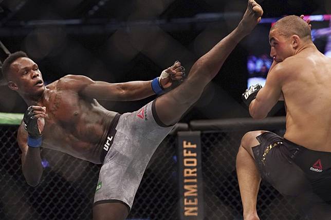 Adesanya wins the middleweight title against Robert Whittaker at UFC 243 in Melbourne, Australia in 2019. Photo: AP