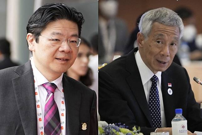 新加坡總理李顯龍（右）宣佈交棒，他的職位將在五月交接給第四代領導團隊選出的接班人、副總理兼財政部長黃循財（左）。（美聯社）