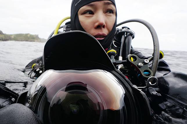 Zhou Fang in a still from the documentary series Underwater China.
