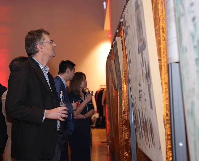 Guests visit a Dunhuang culture exhibition during a reception marking the 75th anniversary of the founding of the People's Republic of China, held in Wellington, New Zealand, Sept. 26, 2024. (Photo by Meng Tao/Xinhua)