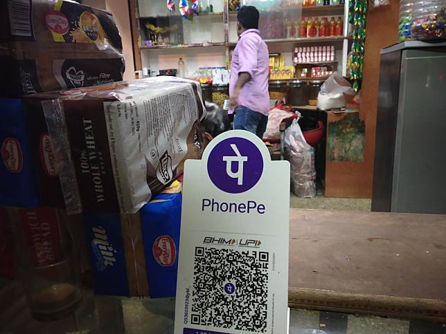 Payments using QR codes are now common in small stores in India. Photo by Avanish Tiwary.