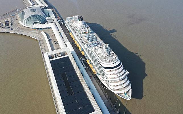 This aerial photo taken on Jan. 1, 2024 shows the large cruise ship Adora Magic City at the Shanghai Wusongkou International Cruise Terminal in east China's Shanghai. (Xinhua/Ding Ting)