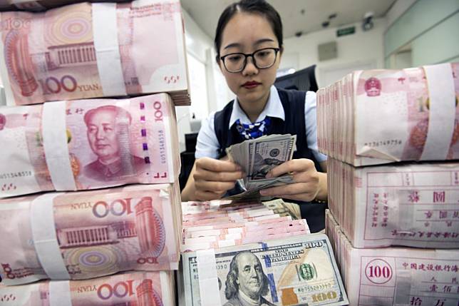 China and the United States contributed over 60 per cent of the US$7.5 trillion increase in global debt over the first half of 2019, according to the Institute of International Finance. Photo: EPA