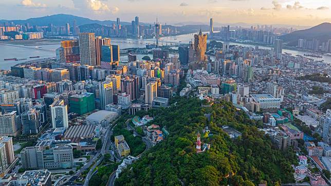 An aerial drone photo shows the Macao Peninsula (front) in south China on July 8, 2024. (Xinhua/Cheong Kam Ka)