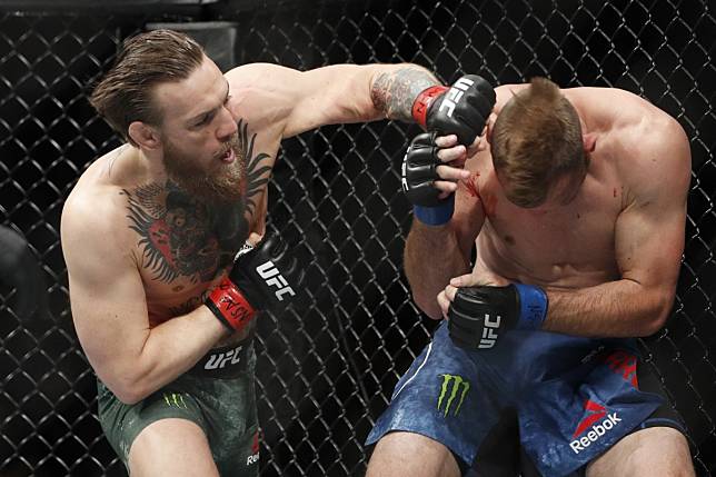 Conor McGregor hits Donald ‘Cowboy’ Cerrone during their UFC 246 welterweight bout. Photo: AP