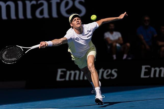 Jannik Sinner hits a return during his Australian Open men's singles fourth round win against Holger Rune in Melbourne, Jan. 20, 2025. (Photo by Hu Jingchen/Xinhua)