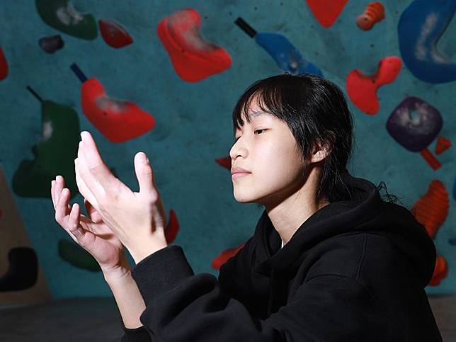 圖說：就讀師大附中的謝昀珊要用雙手證明自己實力。Brian Tan攝影。